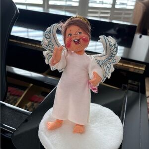 Vintage Annalle baby angel sitting on a cloud